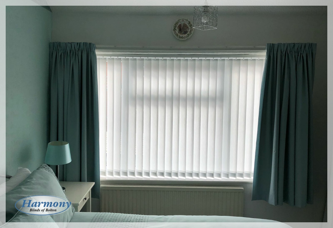 Beautiful Teal Bedroom Decor finished with Vertical Blinds and Curtains