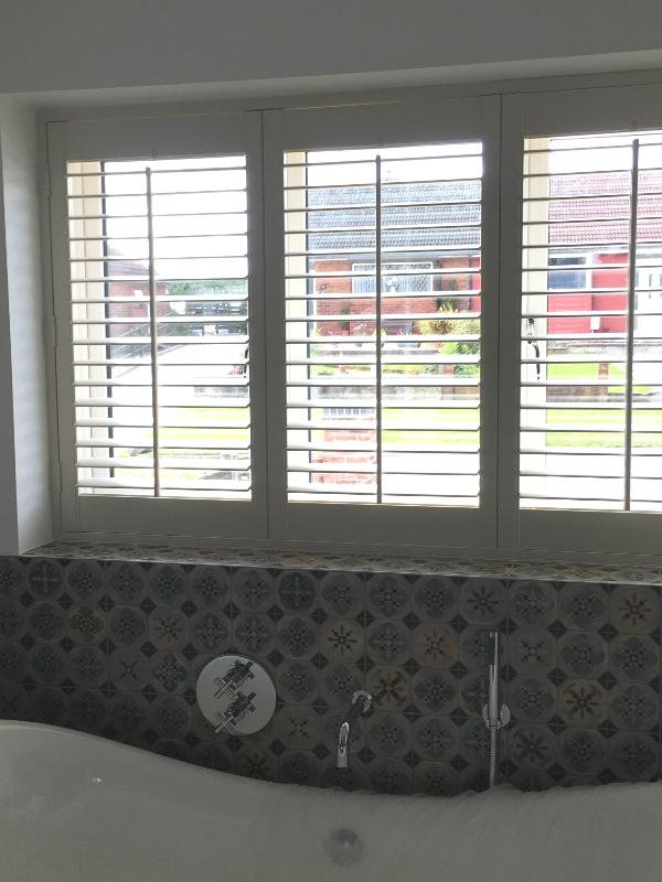 Three Panel PVC Shutters in a Modern Bathroom